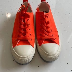 Neon orange converse